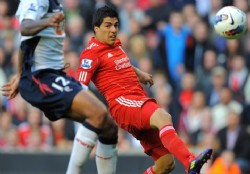 Carragher "orgulloso" de tener a Su�rez
