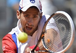 M�naco cae luchando ante Djokovic