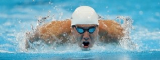 Phelps dio una paliza para entrar a su tercera carrera ol�mpica